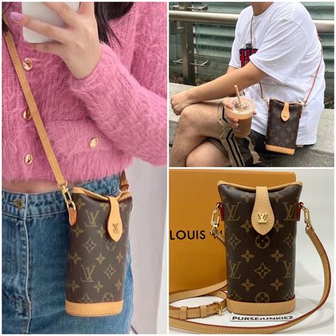 lv fold me pouch|louis vuitton phone pouch.